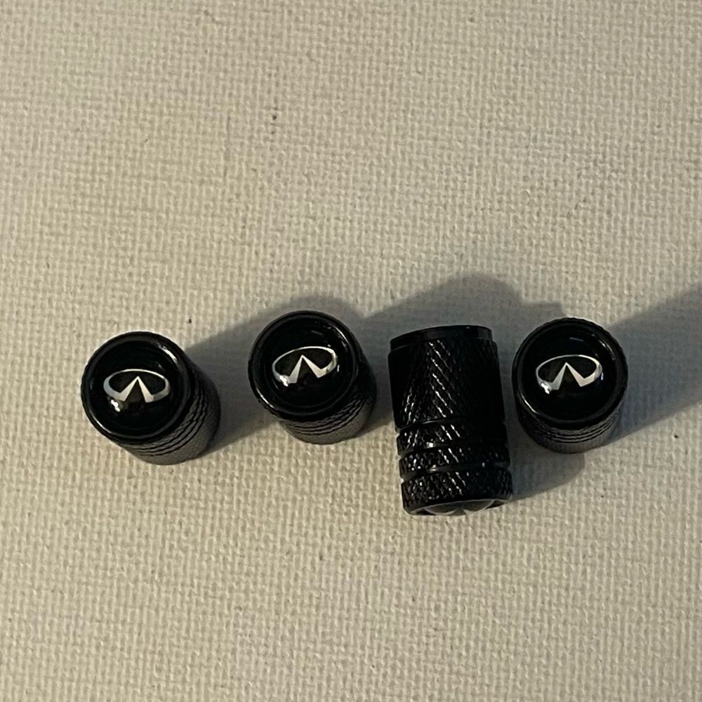 Infinity valve Stem caps in black set of 4 NWT